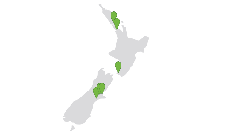 Grey map of New Zealand with green markers