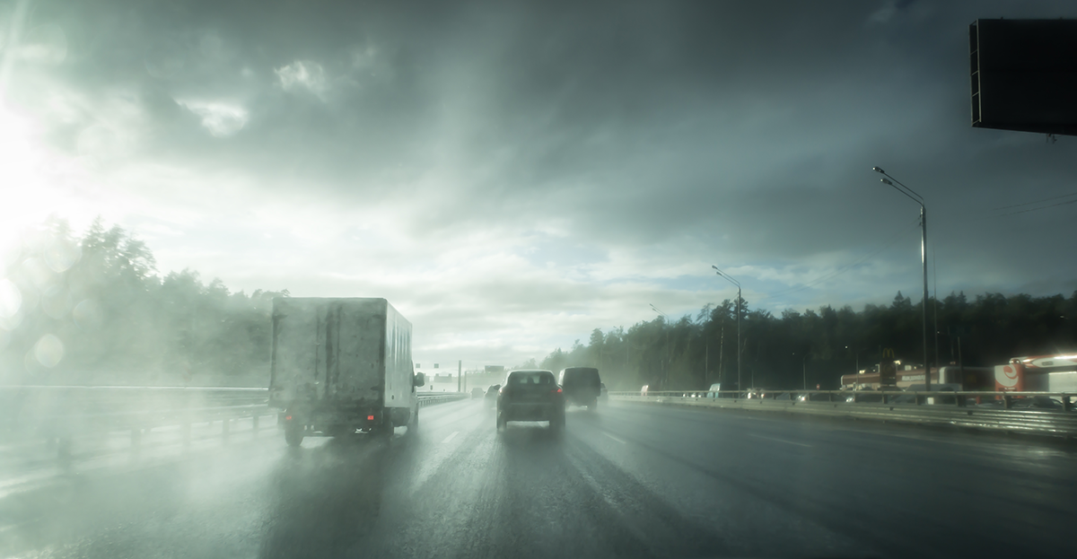Cars driving on motorway in storm